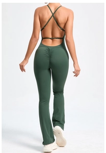 Detail of cross-back straps and scrunch butt lifting effect on green yoga jumpsuit