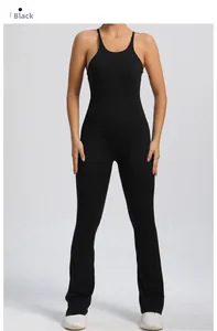 Close-up of black flare leg jumpsuit featuring adjustable straps and a backless design