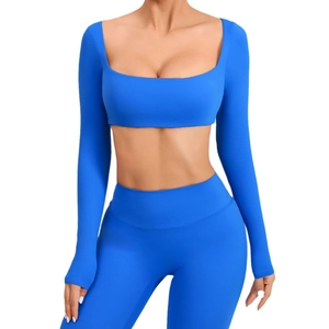 Conjunto de yoga azul real con top de manga larga y leggings de cintura alta
