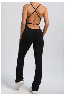 Detail of cross back straps and scrunch butt design on black flare yoga jumpsuit
