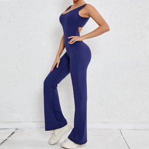 Navy blue backless one-piece yoga jumpsuit with flared pants and body-sculpting fit