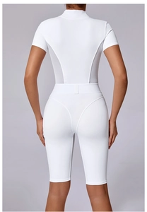 Detailed back view of white yoga bodysuit with breathable mesh panel and zipper collar