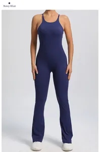 Detail of navy blue flare yoga bodysuit featuring adjustable straps and sculpting fabric