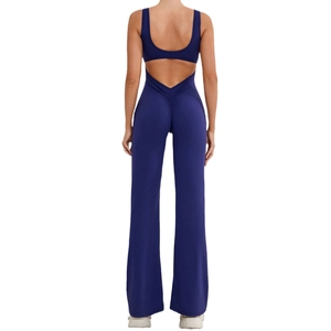 Navy blue backless one-piece yoga jumpsuit with flared pants and peach lift effect