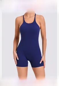 Detail of navy blue one-piece yoga jumpsuit with racerback and slim fit athletic design