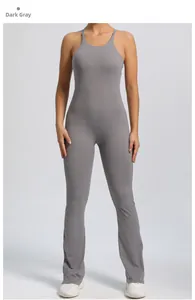 Close-up of dark grey flared yoga unitard featuring adjustable straps and slim fit design