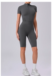 Detail of grey mesh splicing on women's slim fit zip short sleeve yoga bodysuit