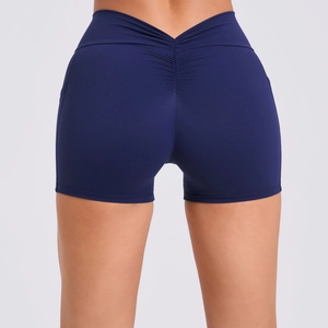 Detail view of navy blue high waist sports shorts with V-shaped back and scrunch butt design