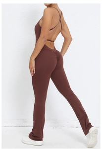 Detailed back view of brown yoga jumpsuit showing cross straps and scrunch butt detail