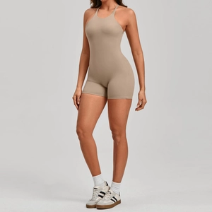 Detail of khaki one-piece yoga jumpsuit featuring a racerback and bodycon athletic fit