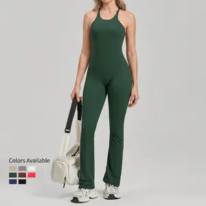 Deep green backless yoga jumpsuit with flared pants and adjustable straps for fitness
