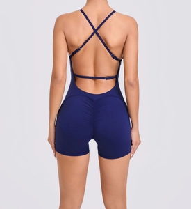 Detail of navy blue ruched back bodysuit with cross straps and adjustable buckle