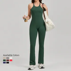 Dark green backless yoga jumpsuit with adjustable straps and flared legs, available in 9 colors