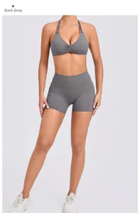 Detail view of dark grey yoga set with racerback sports bra and high waist shorts