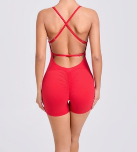 Rear view of red scrunch butt yoga bodysuit with crisscross back straps and metal buckles
