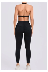 Vue arrière du legging de yoga noir à taille haute avec coutures fessier et poches