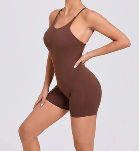 Detail of cross-back straps on high-stretch chocolate yoga bodysuit with open back design