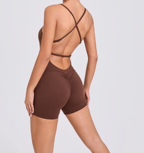 Detail of cross back straps and scrunch butt design on coffee yoga romper