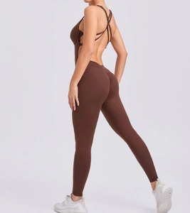 Detail showing the brown backless yoga jumpsuit with scrunch butt and thin straps