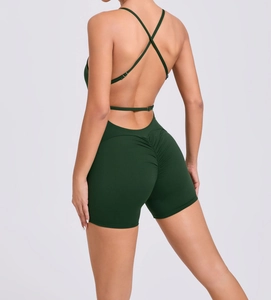 Detail of cross back straps and scrunch butt design on dark green yoga romper