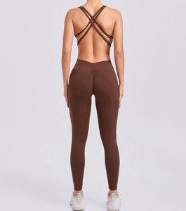 Detail view of the open-back sports bodysuit with scrunch butt lifting effect in brown