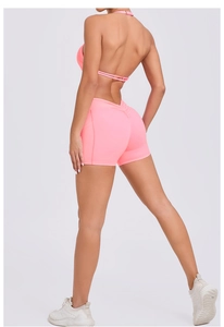 Detail showing high-waist yoga shorts with V-cut back seam and scrunch butt lifting design