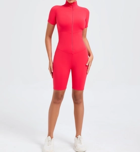 Front view of red high-stretch yoga jumpsuit with short sleeves and front zipper closure