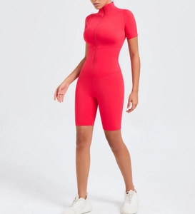 Detail of red short sleeve yoga bodysuit with zipper front and tummy control design