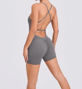Detail of ruched peach lifting back design on grey one-piece yoga jumpsuit for women