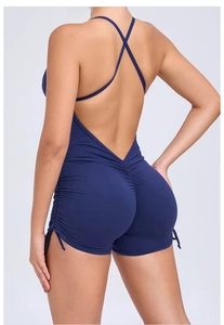Macro detail of the backless ruched yoga bodysuit with adjustable side drawstrings