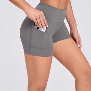 High-waisted yoga shorts in grey with side pockets for phone and scrunch butt design