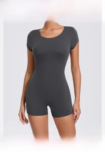 Detail view of backless peach lift yoga romper in dark gray with high elasticity fabric