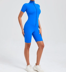 Detail view of electric blue athletic bodysuit with front zipper and short sleeves