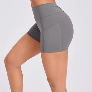 Women's dark grey high waisted yoga shorts with side pockets and slim fit design