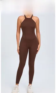 Detail of coffee brown backless yoga jumpsuit with back buckle and V-shape waistline