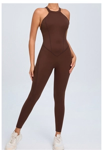 Detail view of coffee brown backless yoga jumpsuit showing halter neck design and texture