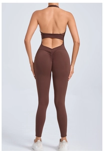 Detail of coffee brown backless yoga jumpsuit featuring scrunch butt and halter neck design