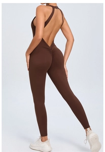Detail view of the back buckle design and gathered scrunch butt on a brown yoga jumpsuit