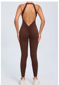 Detail of deep brown open back yoga jumpsuit featuring racerback design and elastic fabric