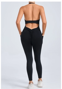 Detail of black backless yoga jumpsuit with ruched butt lifting and cutout design
