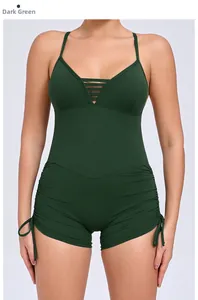 Detail view of dark green yoga bodysuit with side drawstrings and cut-out back design