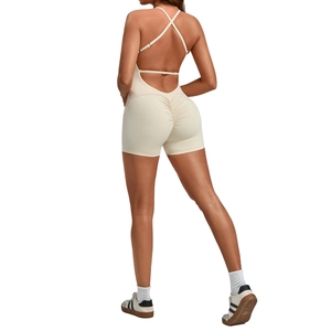 Cream backless yoga romper with cross straps and scrunch butt lifting design for women