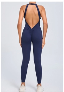 Detail showing back buckle and open back design of navy blue quick-dry yoga jumpsuit