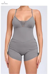 Close-up of deep grey yoga bodysuit featuring V-neckline with hollow-out striped detail