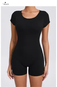 Front view of a tight black short sleeve yoga bodysuit with round neck and elastic fit