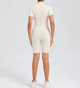 Rear view of cream-white yoga bodysuit featuring tummy control and butt-lifting seam details