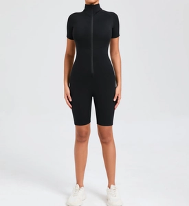 Front view of black slim fit yoga bodysuit with high neck zipper and short sleeves