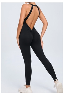 Detail of backless sports bodysuit with metal buckle and scrunch butt lifting texture