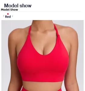 Detailed view of red sports bra with adjustable straps and high elasticity fabric