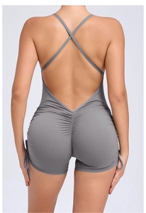 Detail view of backless yoga bodysuit with cross straps and scrunch butt design